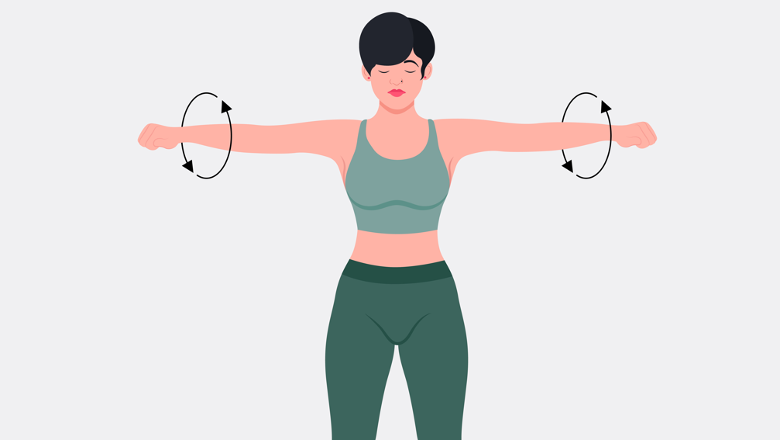 A woman doing arm circles warm-up
