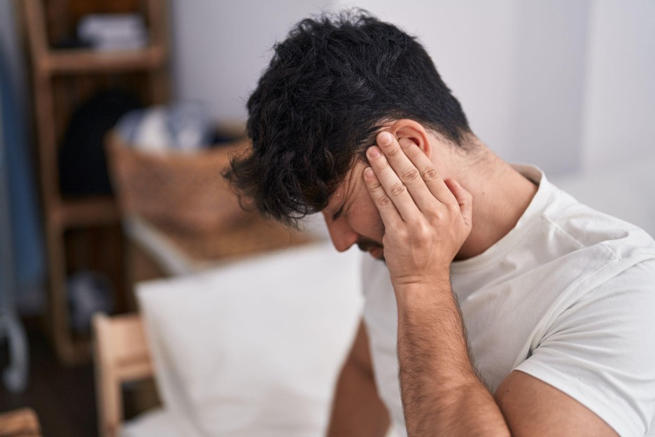 Man suffering from an earache